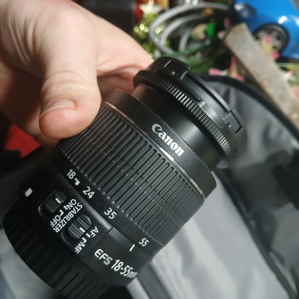 Canon EOS Rebel S II 35mm film camera And EF-S 18–55mm f/3.5-5.6 IS II Bag/charg